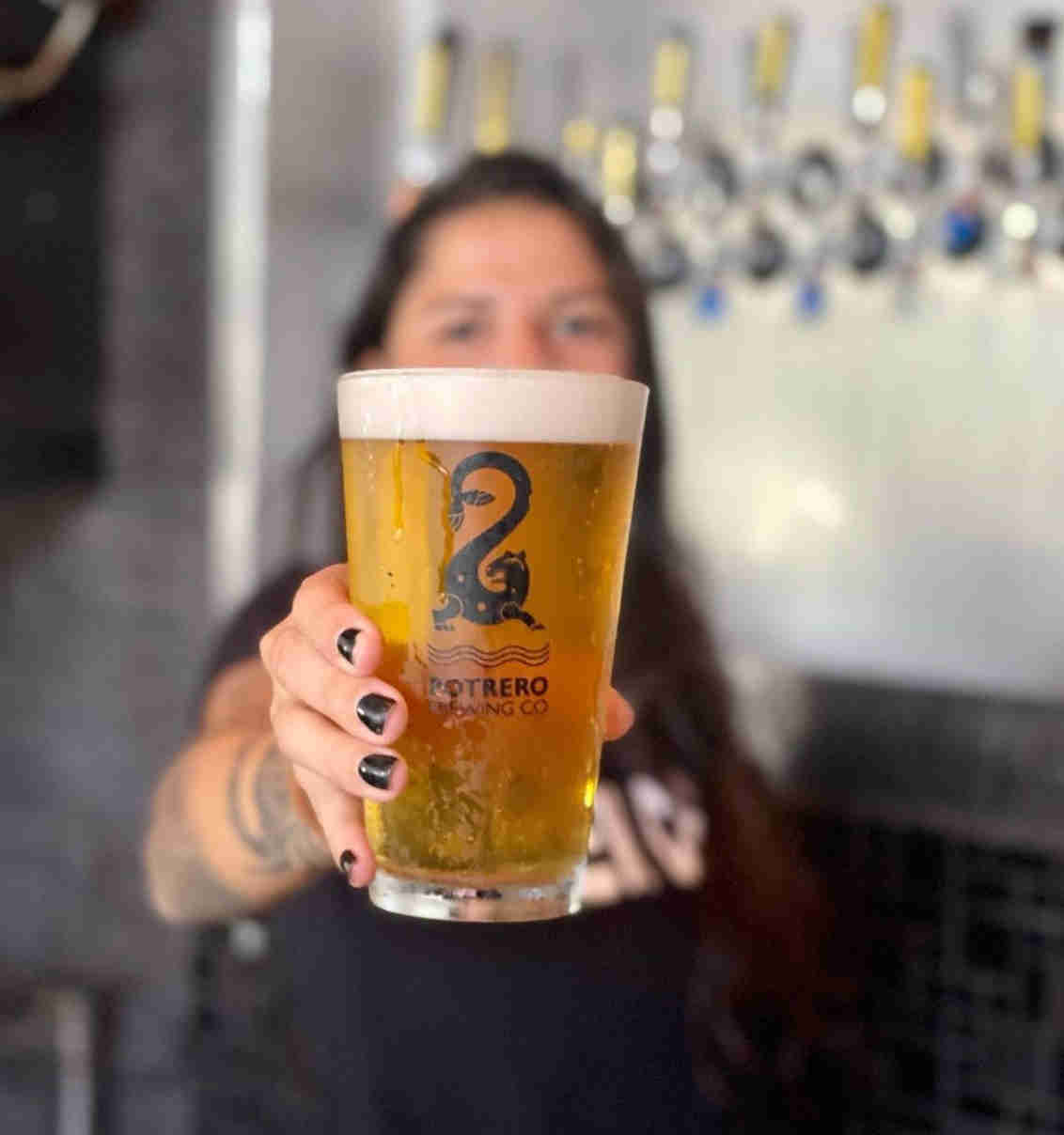 Craft beer being held by the most amazing bartender in all of Costa Rica