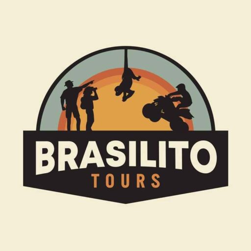 Logo for Brasilito Tours - Cartoon monkey hanging from rainbow and atv driver doing a wheely